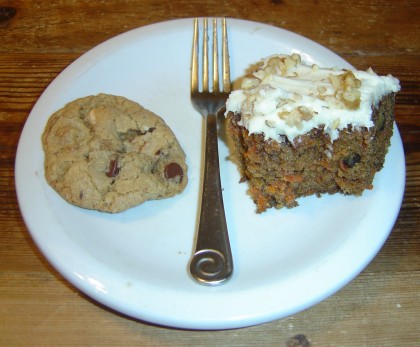 a cookie and a slice of carrot cake