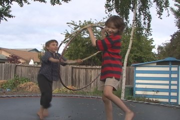 Julian and Arthur are the Lords of the Rings in the 'Lords of the Trampoline' music video