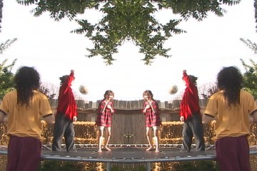 Sam, Chris, and Arthur in the 'mirror mirror' sequence of the 'Lords of the Trampoline' music video