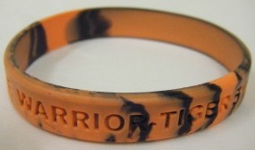 a tiger-patterned 'Wildlife Warriors' wristband